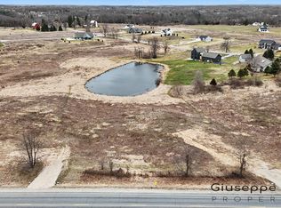 8707 Cannonsburg Rd NE, Ada, MI 49301