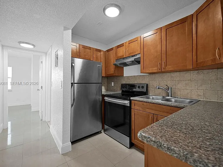 6953 SW 7th St — Photo 3