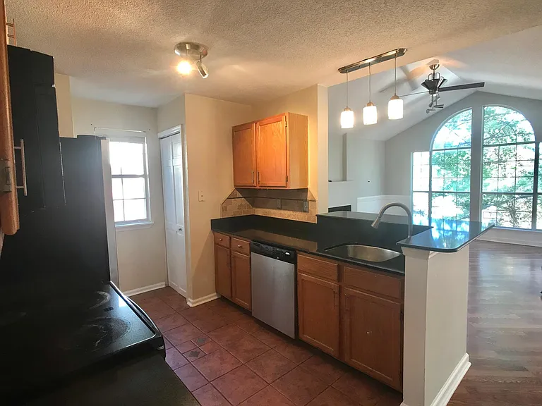 Stainless steel appliances and granite countertops kitchen