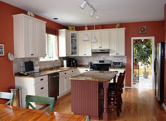 Kitchen Opens to Sunroom and Deck