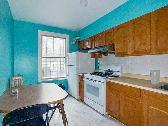 2nd image of 11106 Farmers Blvd #2