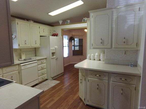 4th image of 8016 Lemonwood Dr N