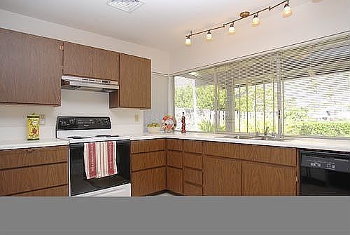 Kitchen has new tile floors and is in excellent condition