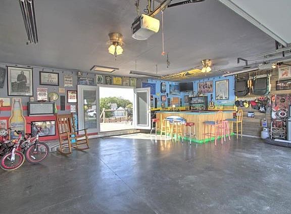 This 3 car garage with a 4' extension is the perfect entertaining spot and will provide you plenty of work space.