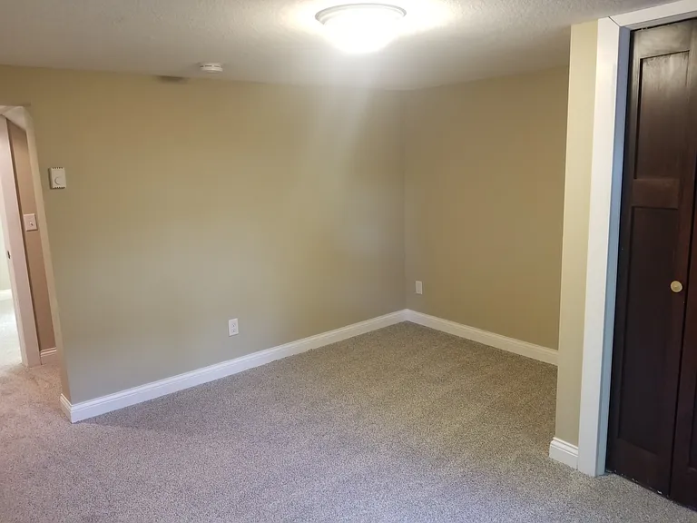 Large bedroom with room for 2 full size beds allows room for all your furniture. Includes egress window and smaller window offering plenty of natural light.