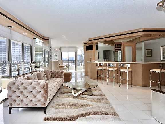 2nd image of 3500 Mystic Pointe Dr APT 1008