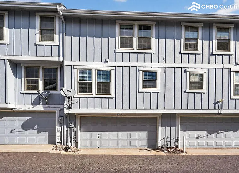 2 car garage with full size washer and dryer inside.