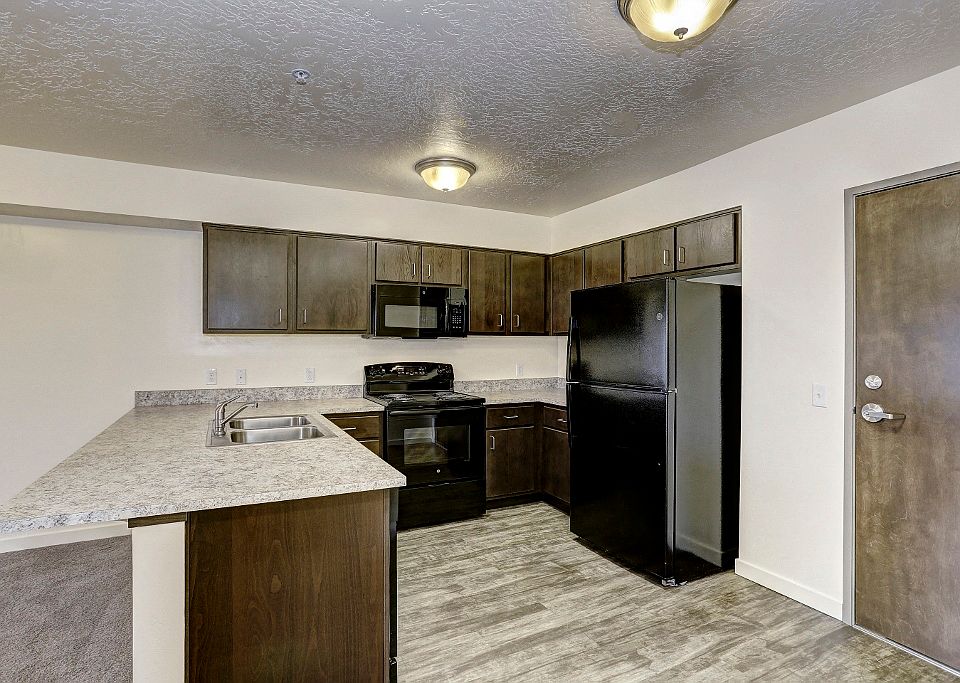 Kitchen with Fridge, range, and microwave