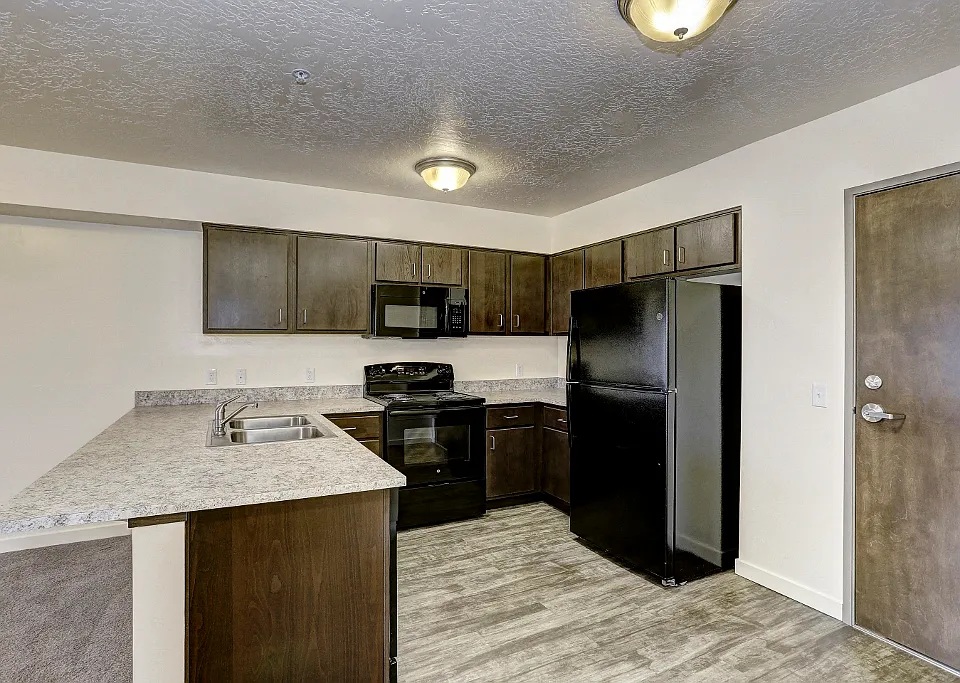Kitchen with Fridge, range, and microwave