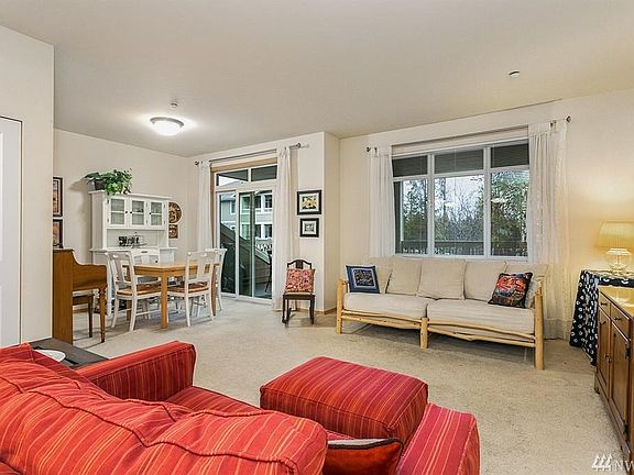 Spacious living room with large windows to let in tons of natural light.