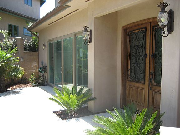 Front entrance & sliding doors to dining room.