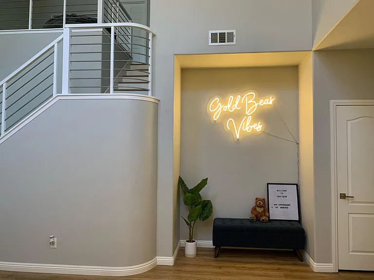 Gold Bear Vibes Signage and Reading Nook