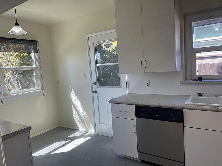 Kitchen with backyard access door