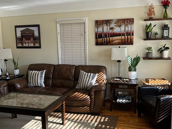 Living Room (view after looking right from front door vestibule area that includes shoe or coat closet)