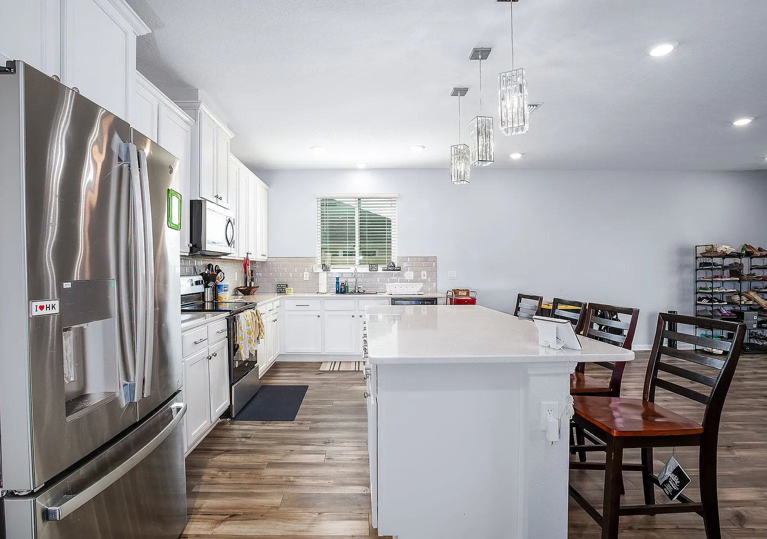 Spacious 3BR Home with Flex Space, Large Backyard & Open Floor Plan — Photo 4