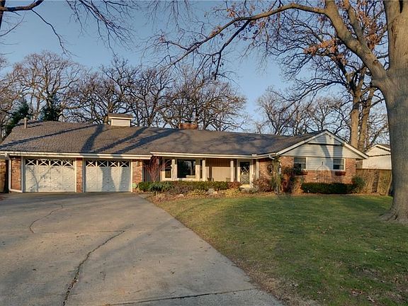 2 car garage is oversized with a washable mat material. There is also a large storm shelter in the g
