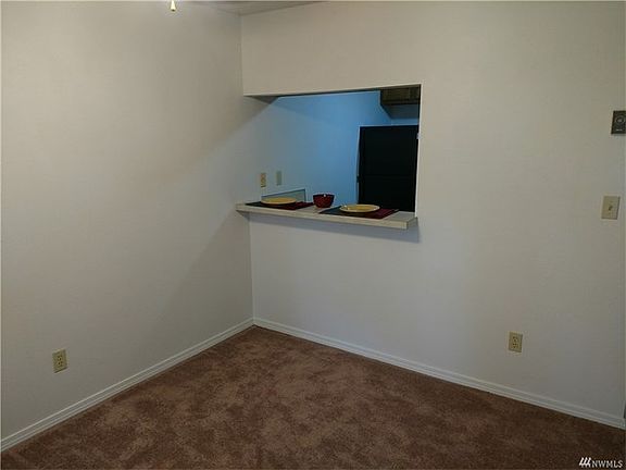 Nice little peek a boo from the dining to the kitchen for bar stools or using as a pass thru for parties.