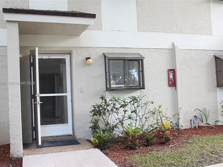 110 Gardens Dr #103 — Photo 1
