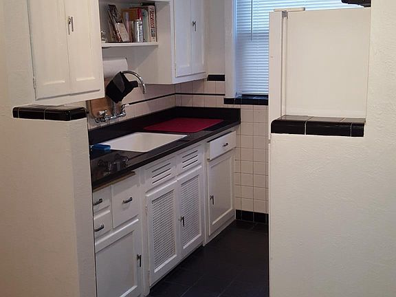 Granite counter-top and tile flooring