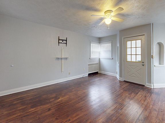 Large Living Room with coat closet, 50" TV wall mount and ceiling fan