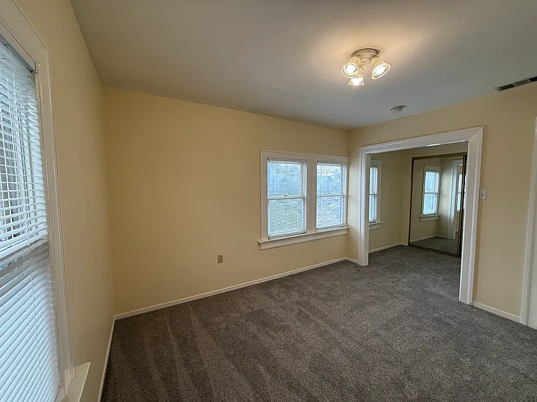 Southeast bedroom from east wall to the dressing area in the S/E corner