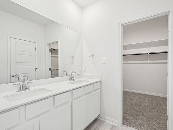 Primary suite bathroom in the Sabine floorplan at a Meritage Homes community.