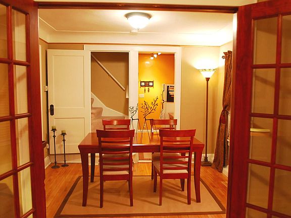 View of formal dining room from office/den/bdrm.
