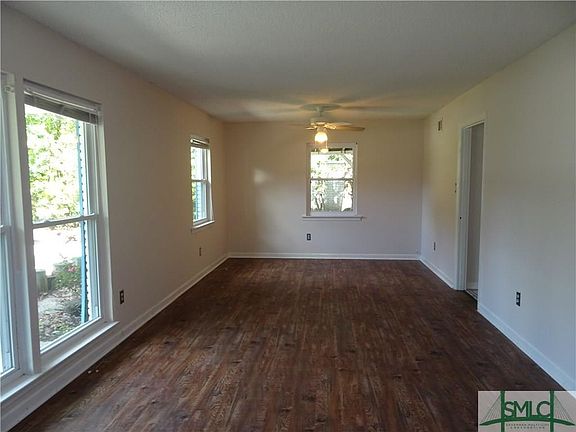 View of living room from entrance.  Vinyl plank flooring