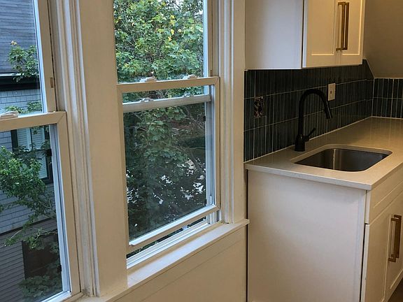 Two big, low windows...perfect spot for a coffee bar and perusing the Internet before work :) An eat-in kitchen with flexibility to meet your life style.