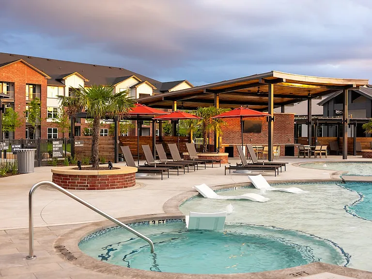 Spa with poolside lounge