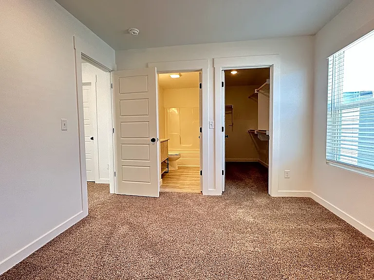 Master bedroom has huge walk-in closet and private bath.