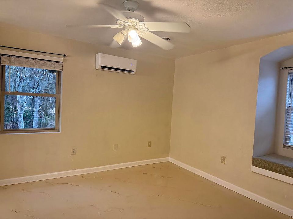 Large Bedroom, easily hold a king size bed.. Mini split HVAC, Epoxy flooring, Relaxing window seat with storage.