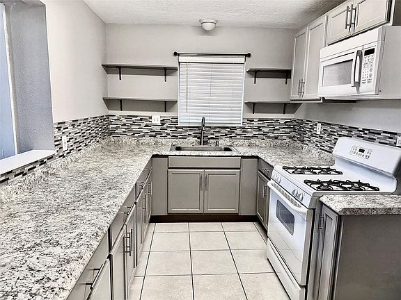 4th image of 12235 W Village Dr Unit D