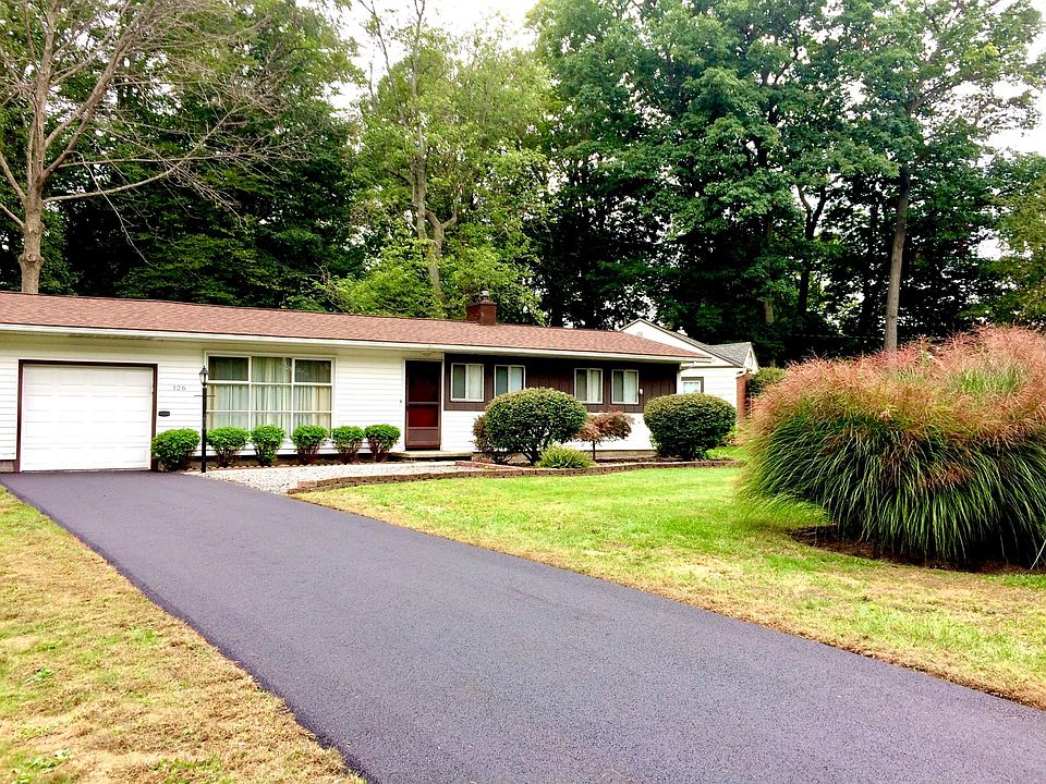 New paved drive. Garage has 2 openers and a touch pad to open garage