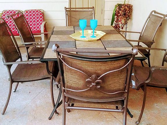 Outdoor dining space and grill
