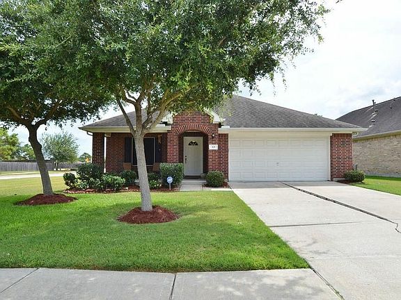 Beautifully landscaped and great covered patio for your enjoyment.