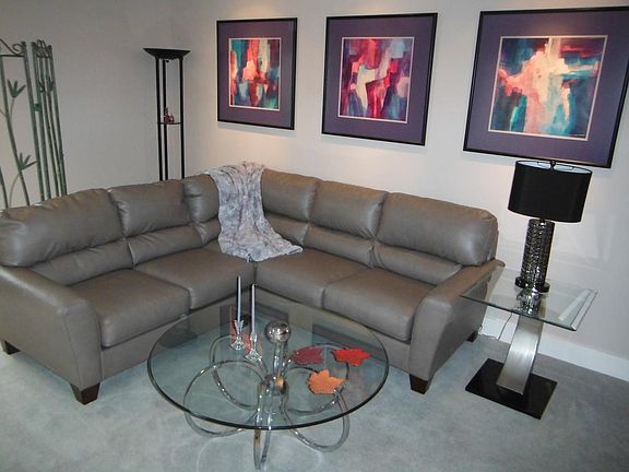 living room opens to patio and dining room