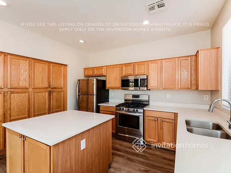 8704 N 58th Dr — Photo 5