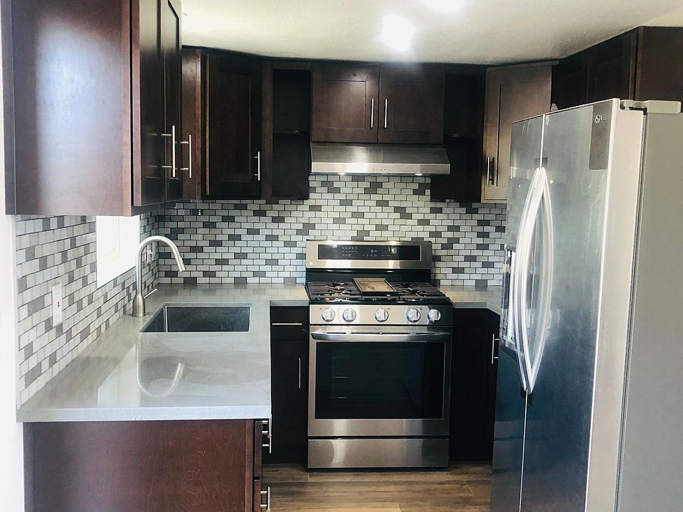 New kitchen cabinet with stainless steel appliances