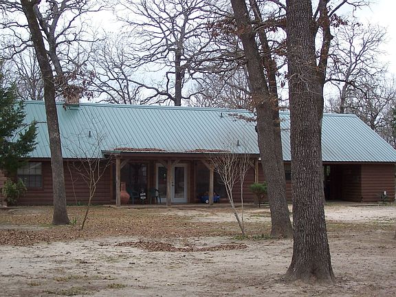 VIEW OF BACK OF LOG HOME