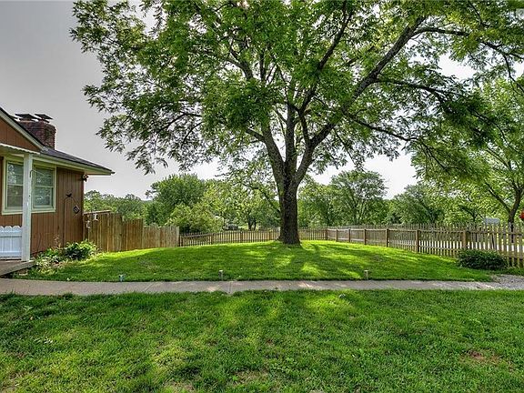 This is the view of the front yard, with the picket fence all the way around.