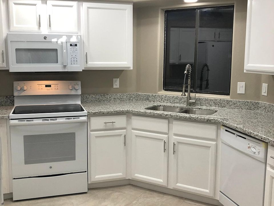 New Kitchen Appliances: In this picture you can see the new GE Microswave, Stove and Dishwasher