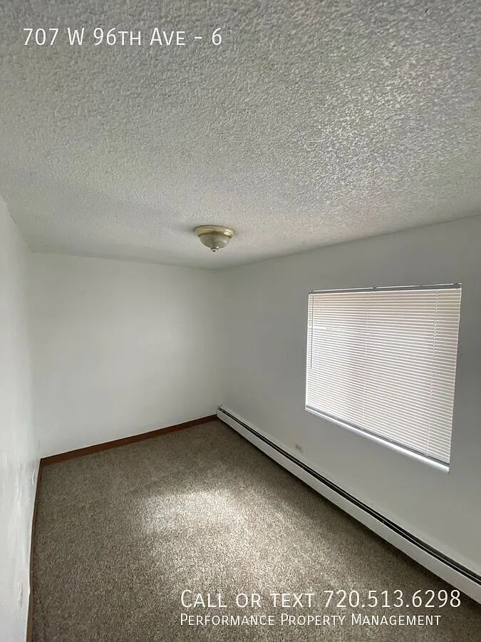 Building Photo - 707 W 96th Ave #6