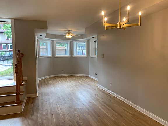 Spacious dining room living room area.