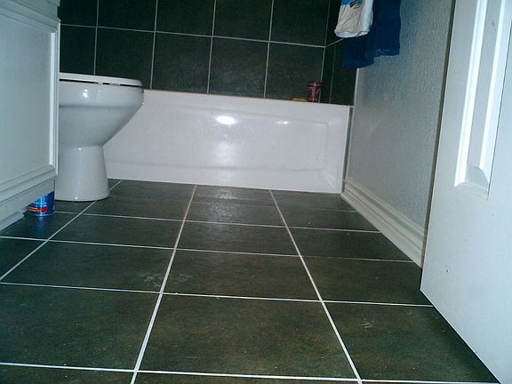 main bathroom floor tile done in same tile