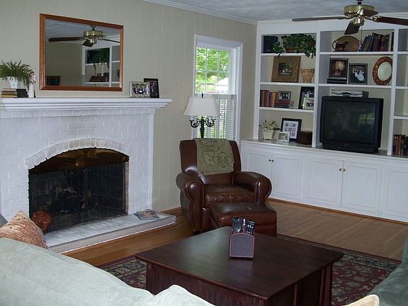 Cozy Den w/ Built-Ins & Fireplace