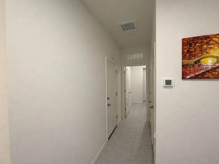 Hallway to Laundry Room and Garage