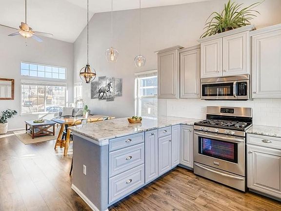 Kitchen looking into dining rm/living rm
