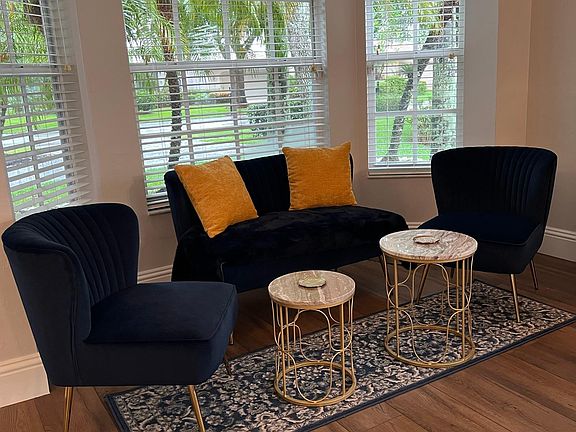 Sitting area off front door.