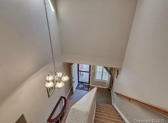 Grand Entry with Tiled Floors, warm paint tones and Updated Ligh